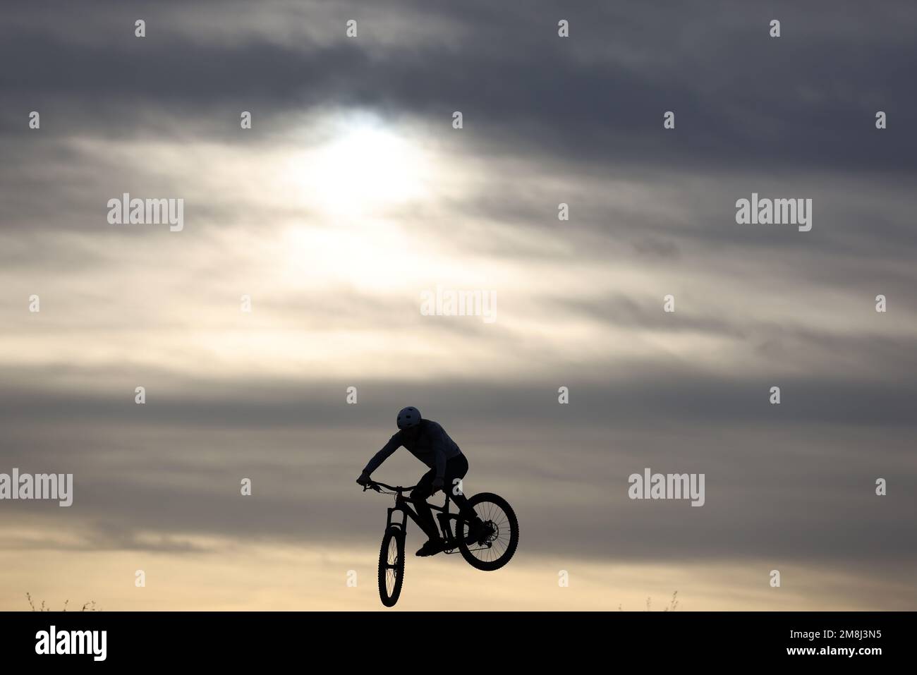 Mountain bike riders in action at a BMX and pump track near Fleet in Hampshire Stock Photo Alamy