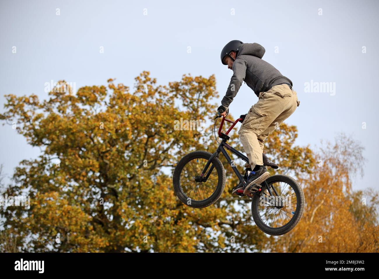 Mountain bike riders in action at a BMX and pump track near Fleet in Hampshire Stock Photo Alamy