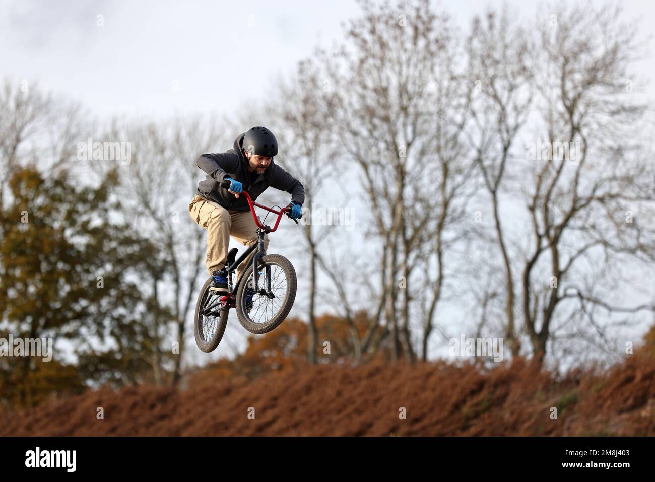 Mountain bike riders in action at a BMX and pump track near Fleet in