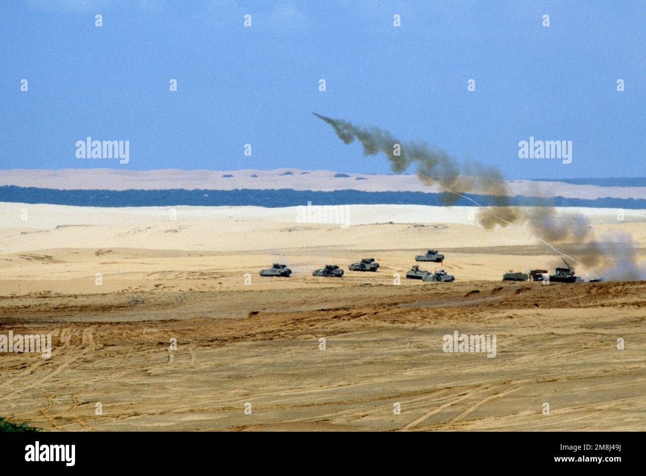 A Mine Clearing Line Charge, or MICLIC, is fired on a range during a ...