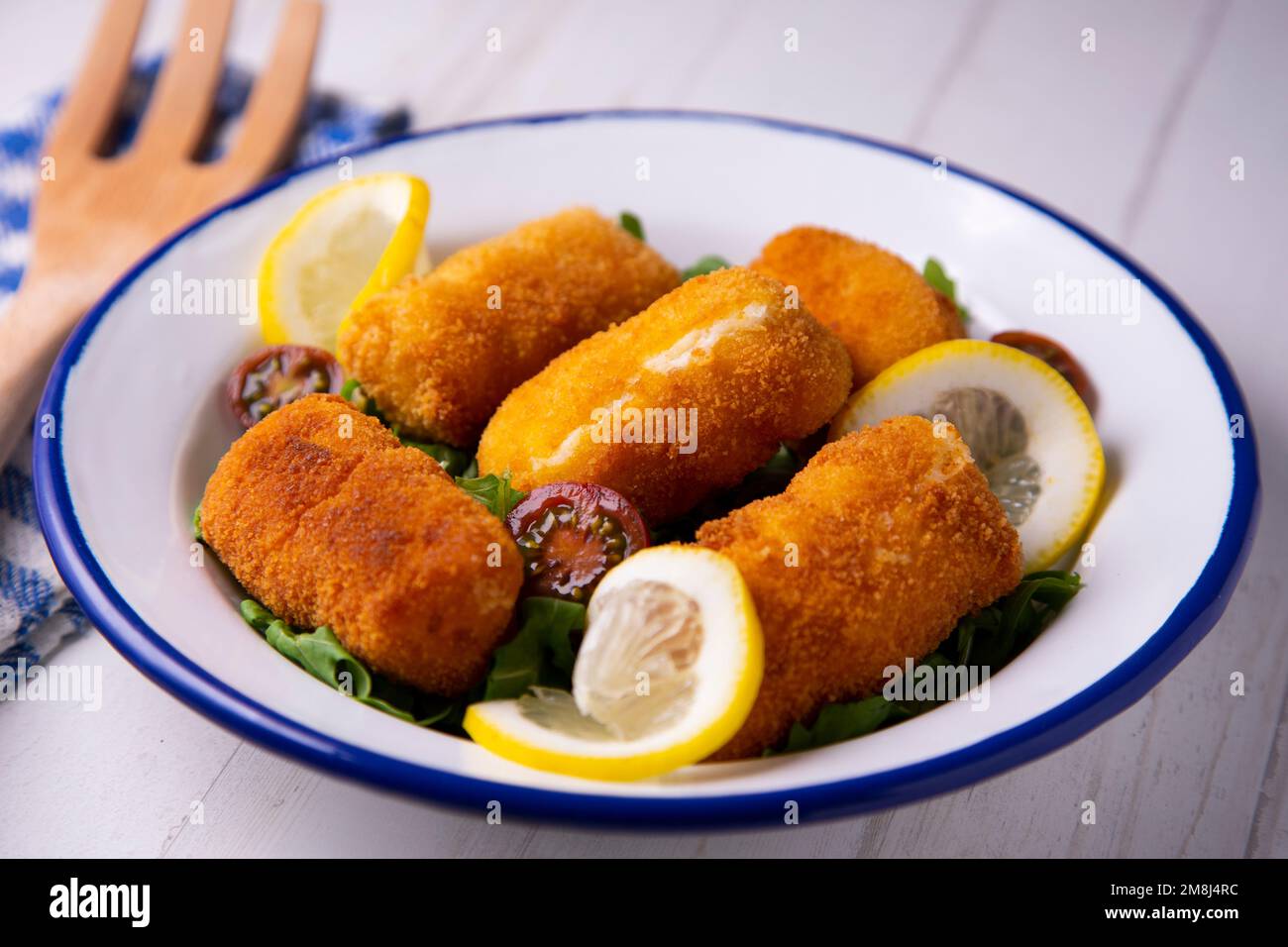 Fish croquette. The croquette is a portion of dough made from a dense