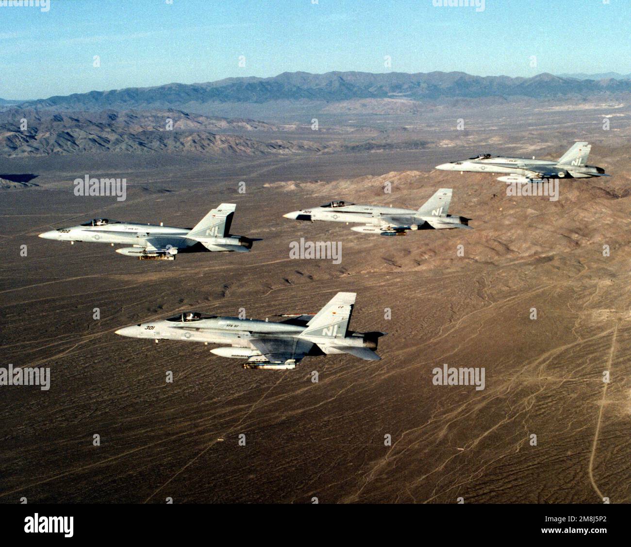Four F/A-18C Hornet aircraft of Strike Fighter Squadron 97 (VFA-97 ...