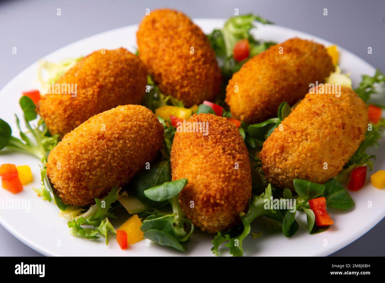 Spanish croquettes. The croquette is a portion of dough made from a