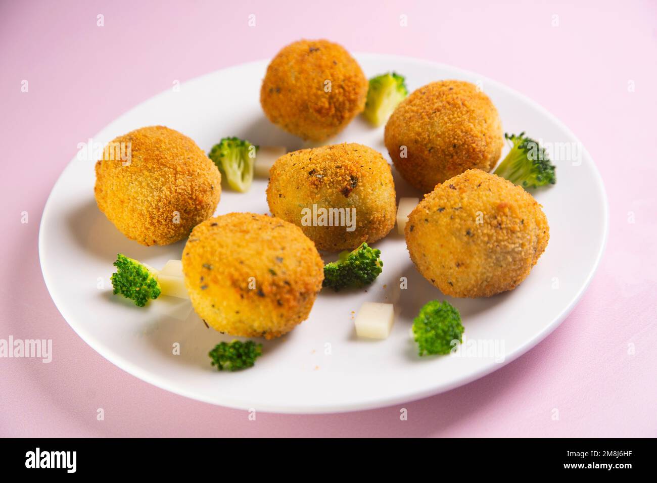 Broccoli croquette. The croquette is a portion of dough made from a