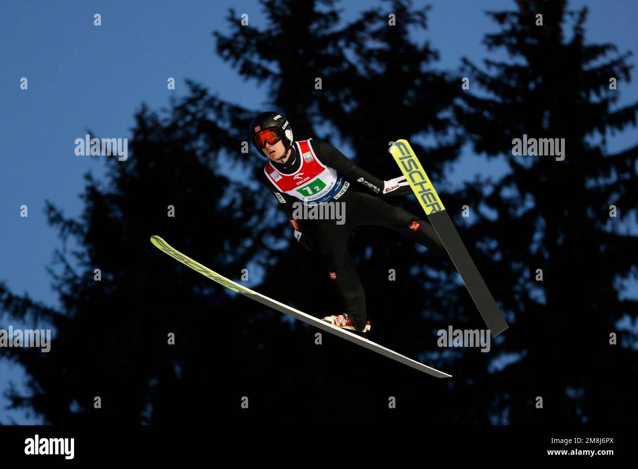 Kristoffer Eriksen Sundal, of Norway, soars through the air during his