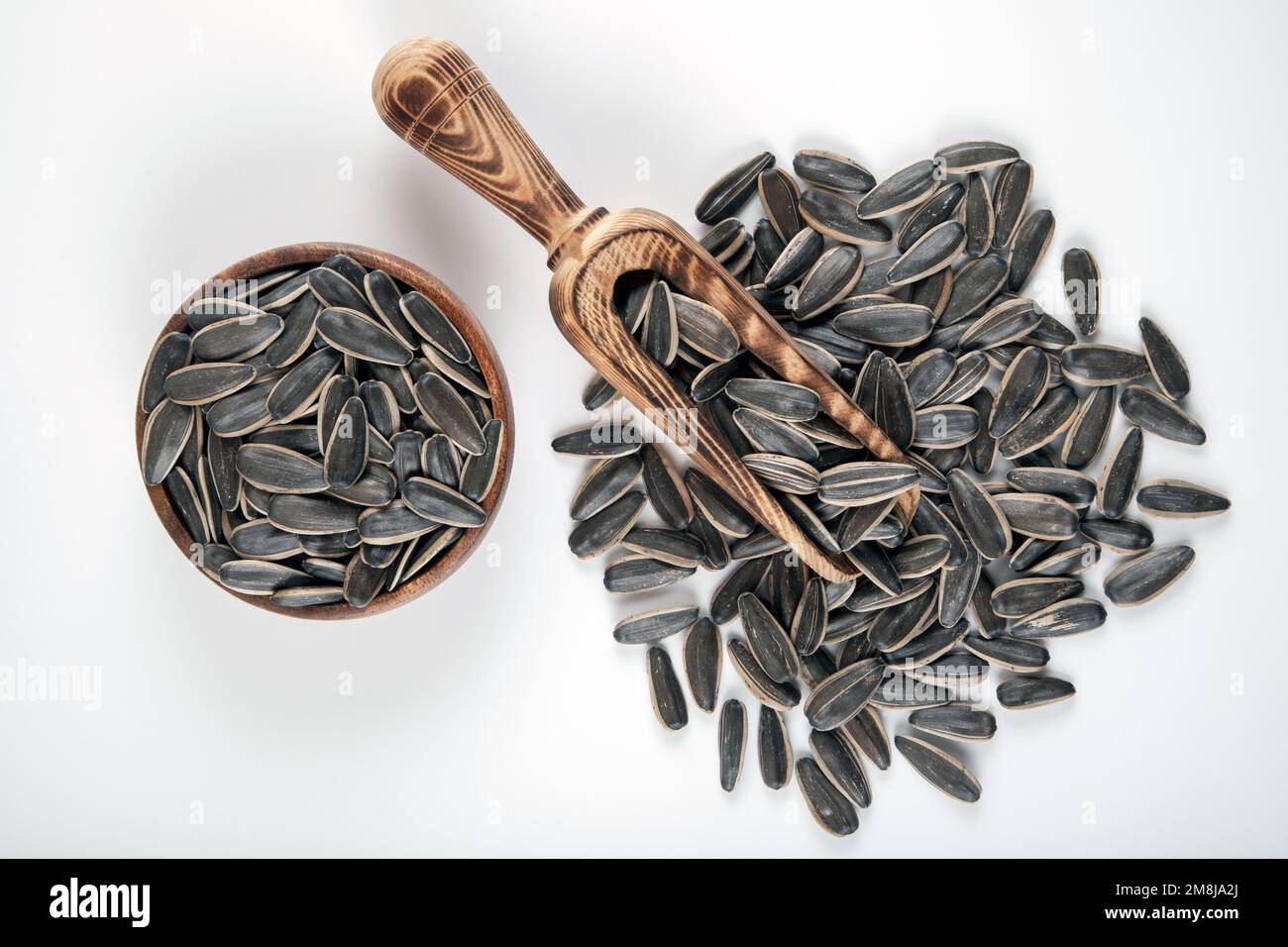 Black sunflower seeds in white hi-res stock photography and images - Alamy