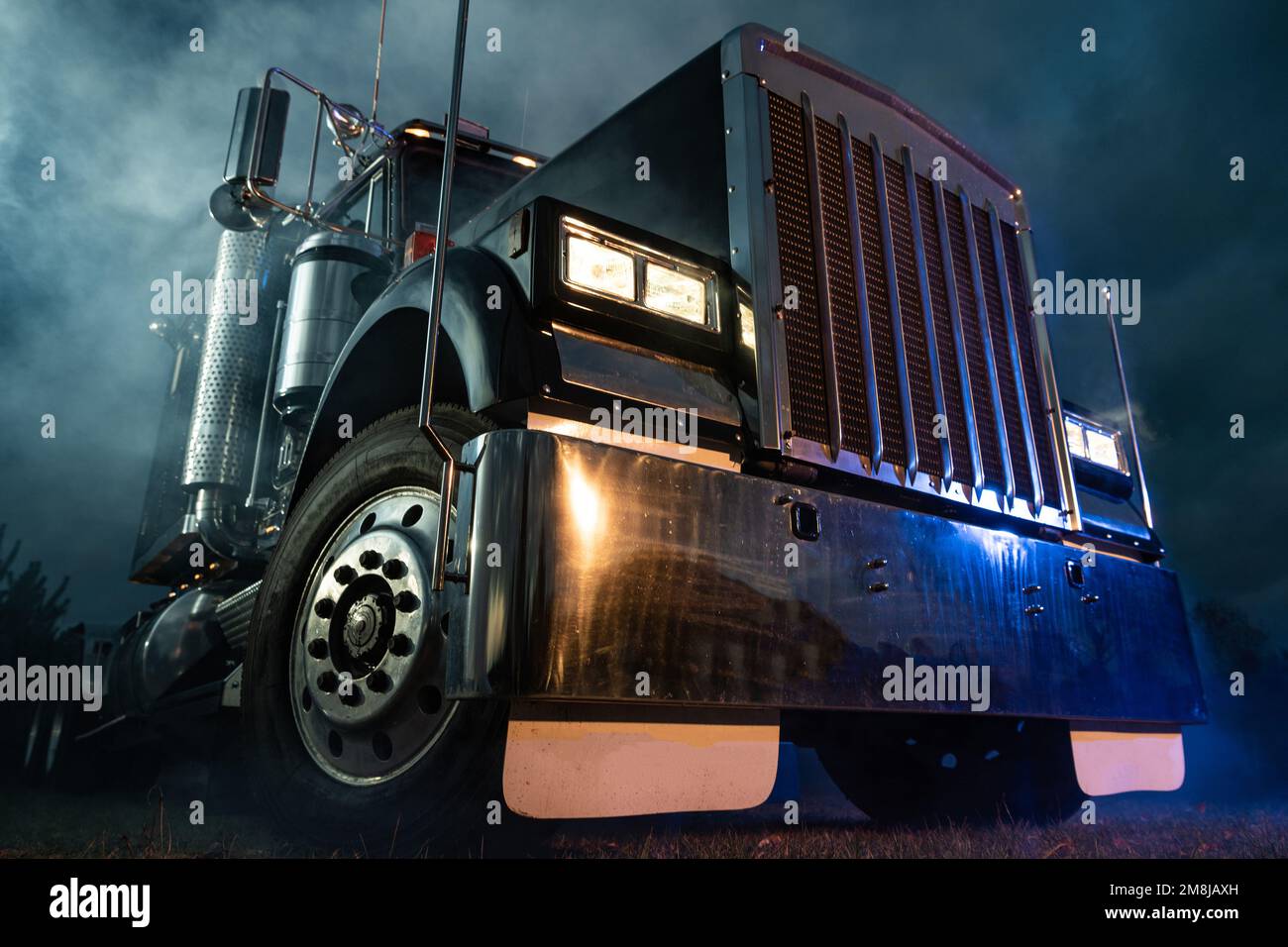 Retro Semi Truck Tractor Night Time Bluish Illumination and Foggy