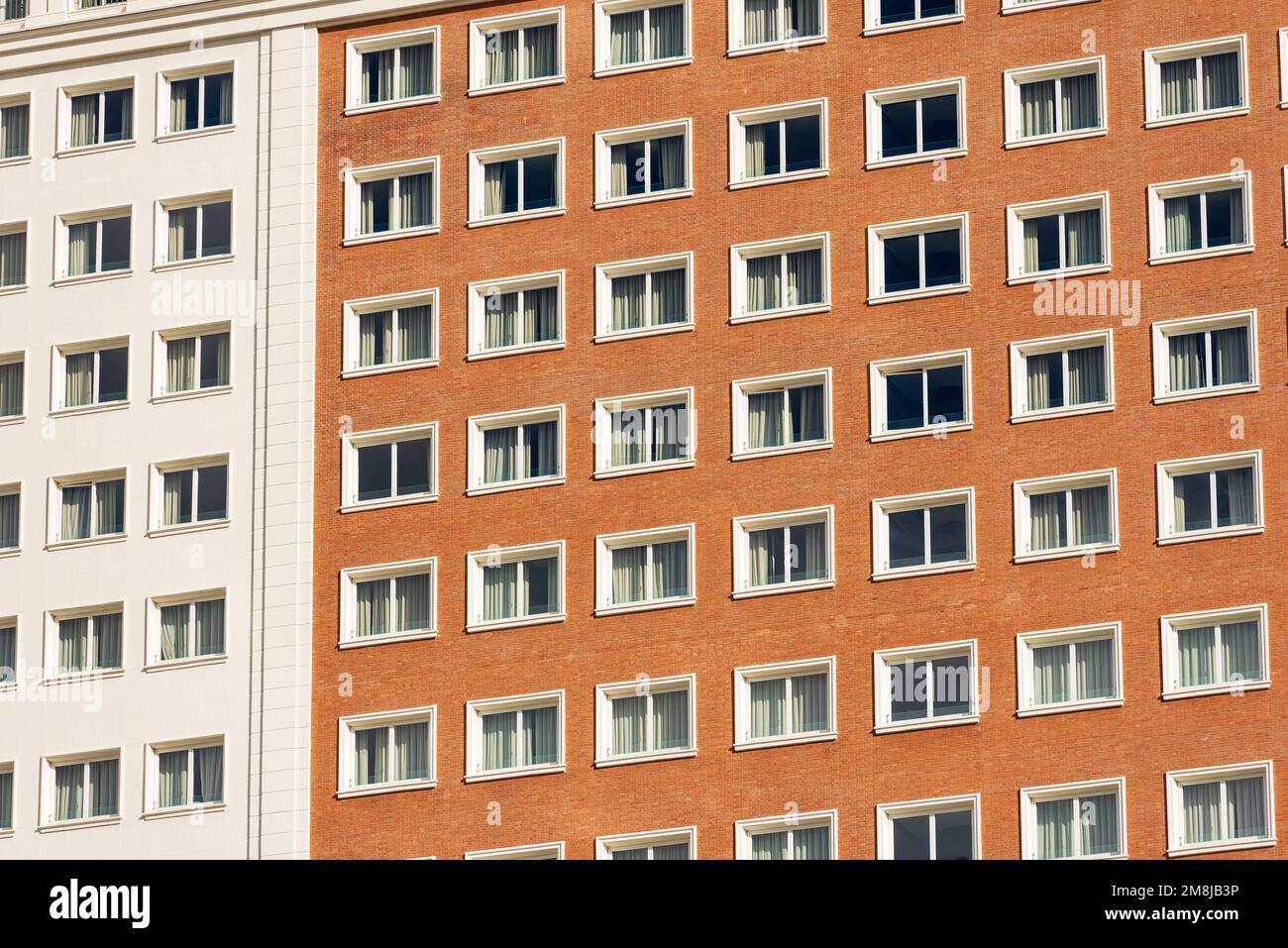 Closeup of a facade of a generic residential building in Madrid downtown, Plaza de Espana. Community of Madrid, Spain, southern Europe. Stock Photo