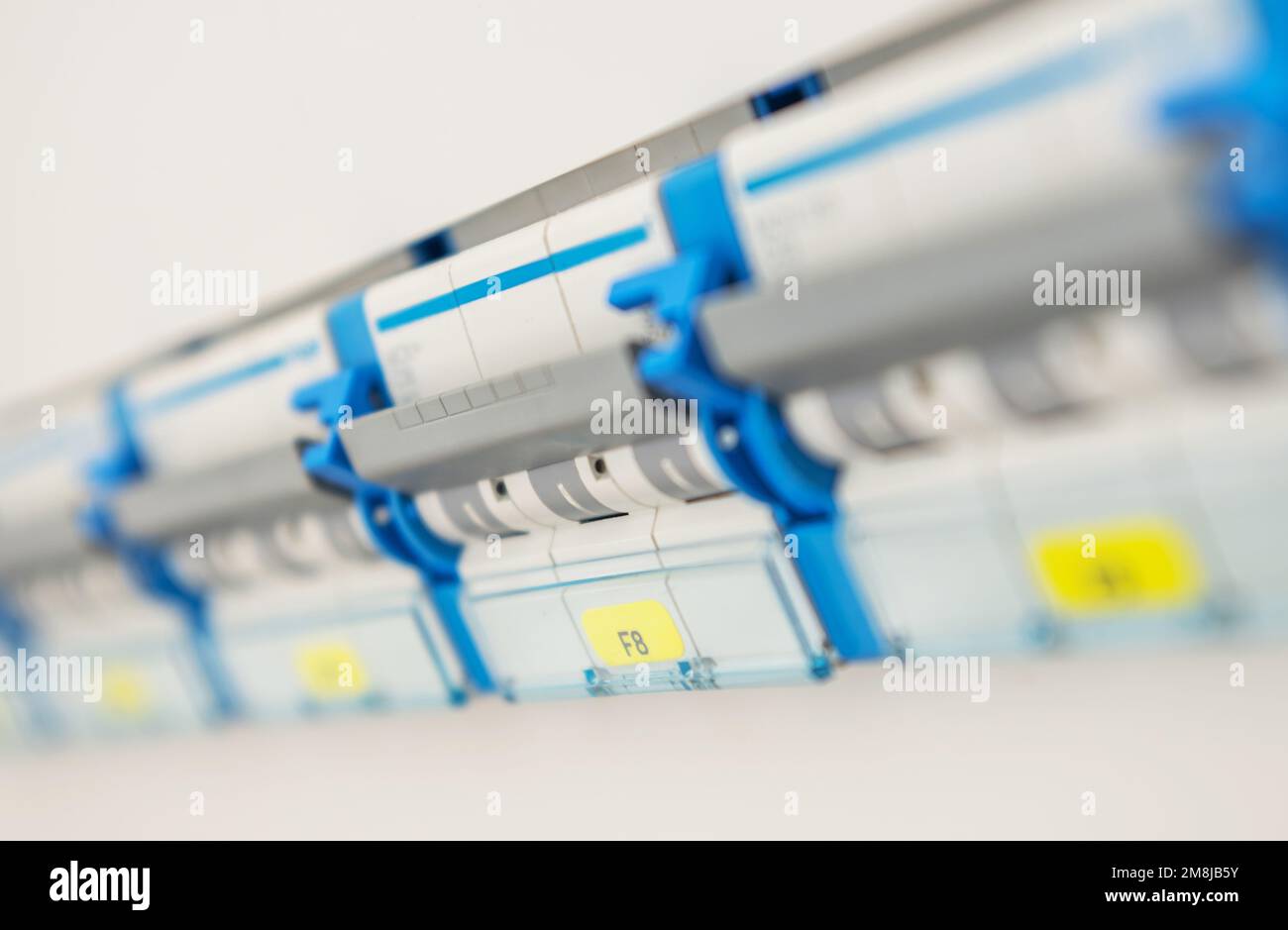 Electricity Systems. Modern Electric Fuse Board Close Up Stock Photo