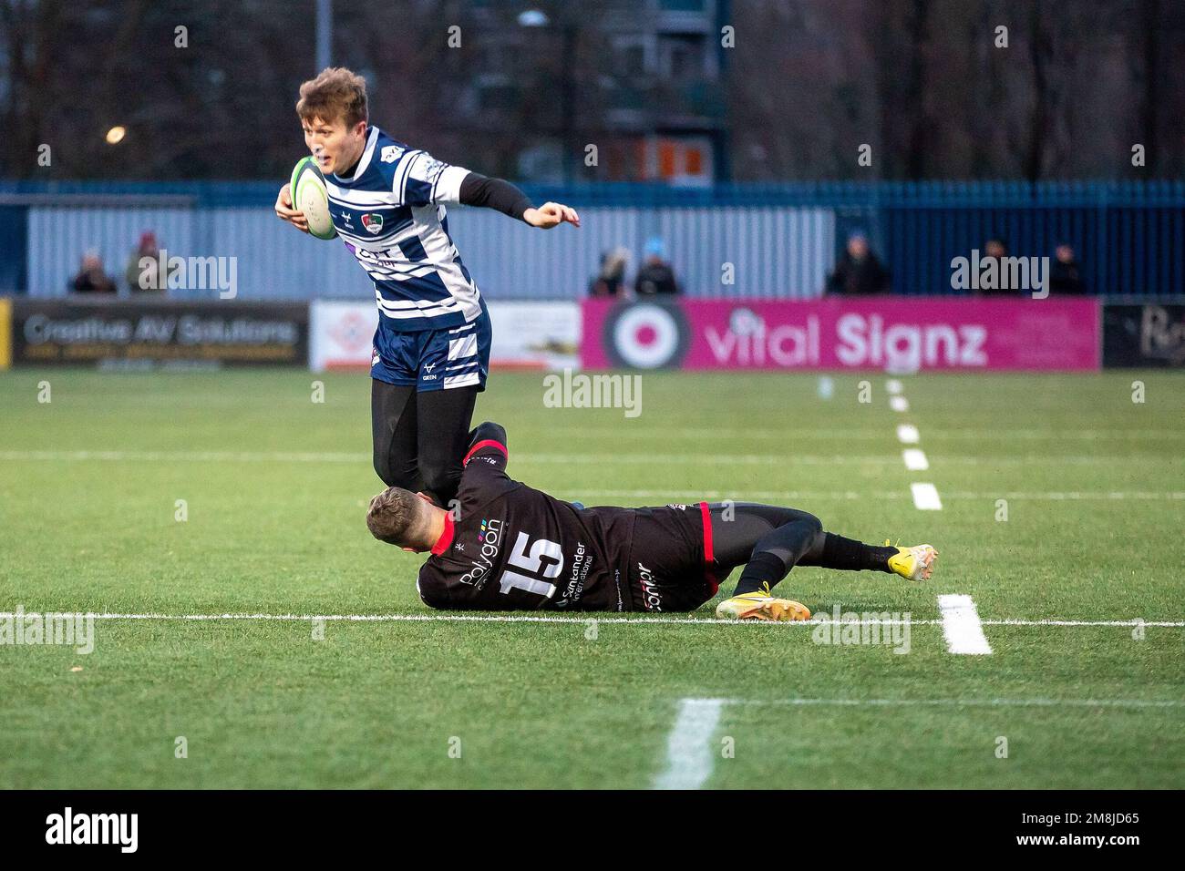 Coventry, UK. 14th Jan, 2023. ***Brendan Owen of Jersey tackles James Martin of Coventry during the Rugby Championship match between Coventry and Jersey Reds at Butts Park Arena, Coventry, UK on 14 January 2023. Photo by Simon Hall. Editorial use only, license required for commercial use. No use in betting, games or a single club/league/player publications. Credit: UK Sports Pics Ltd/Alamy Live News Stock Photo