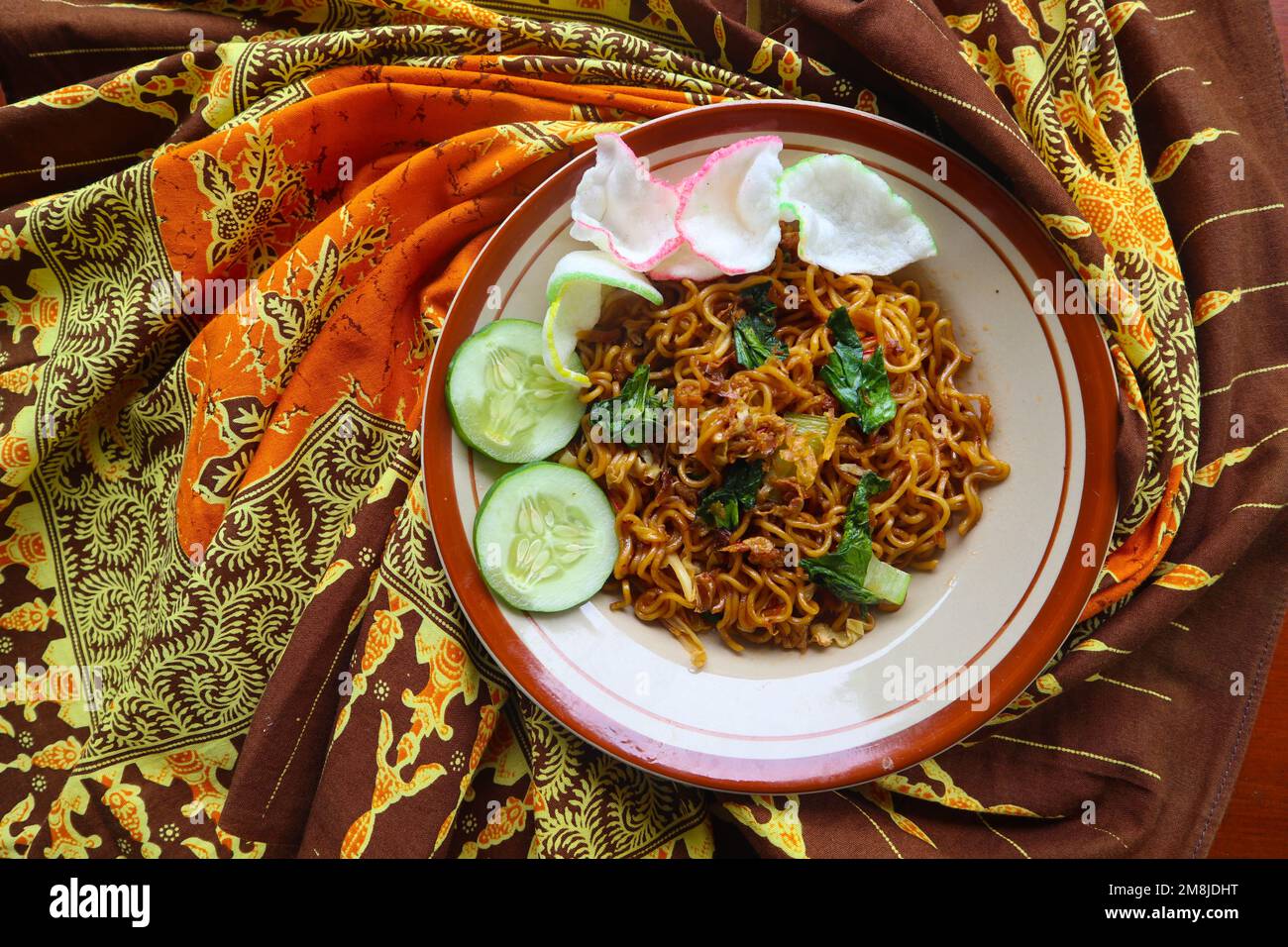 mie tek tek or fried noodle made with egg noodles with chicken, cabbage
