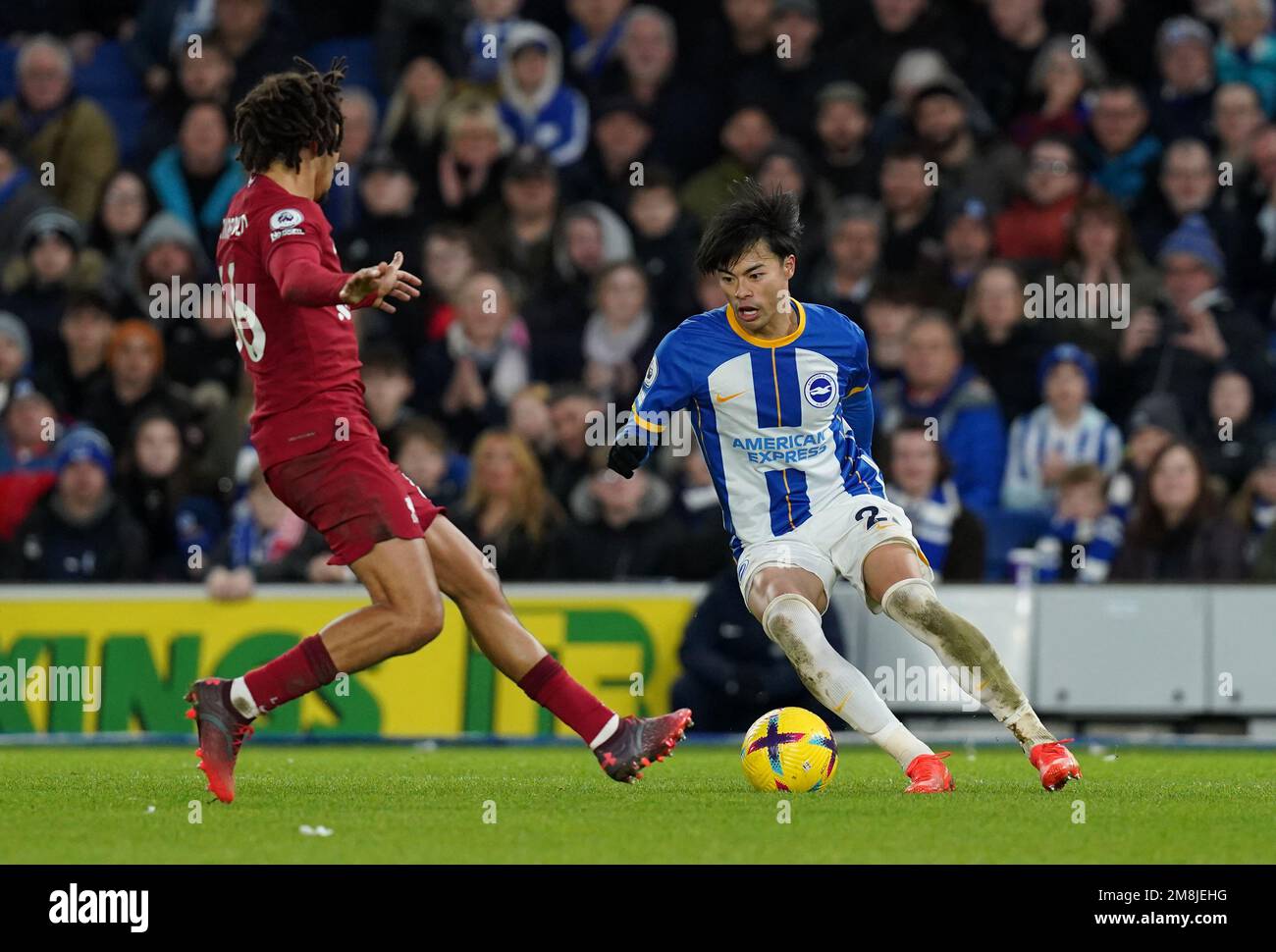 Brighton and Hove Albion's Kaoru Mitoma (right) and Liverpool's Trent ...