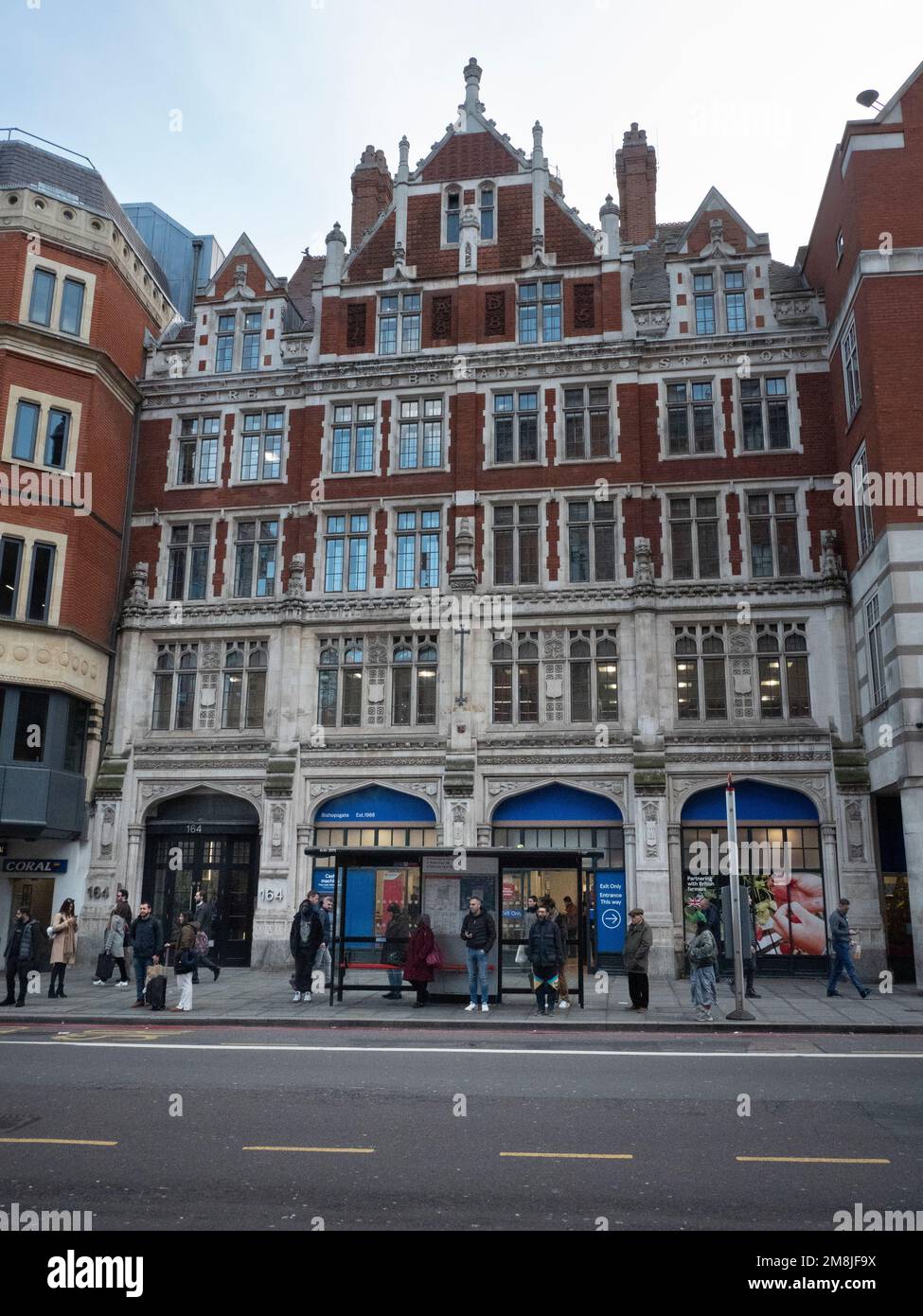 Tesco branch in Bishopgate,  previously Bishopsgate fire station built in 1907, closed as fire station in 1965, London UK Stock Photo