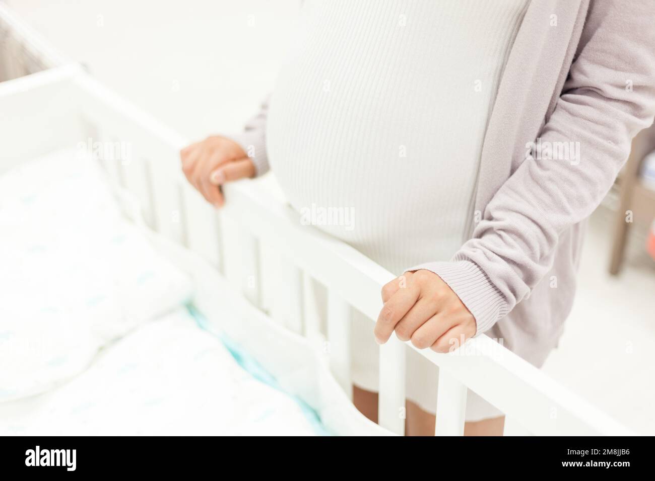 Pregnant women to buy baby products Stock Photo