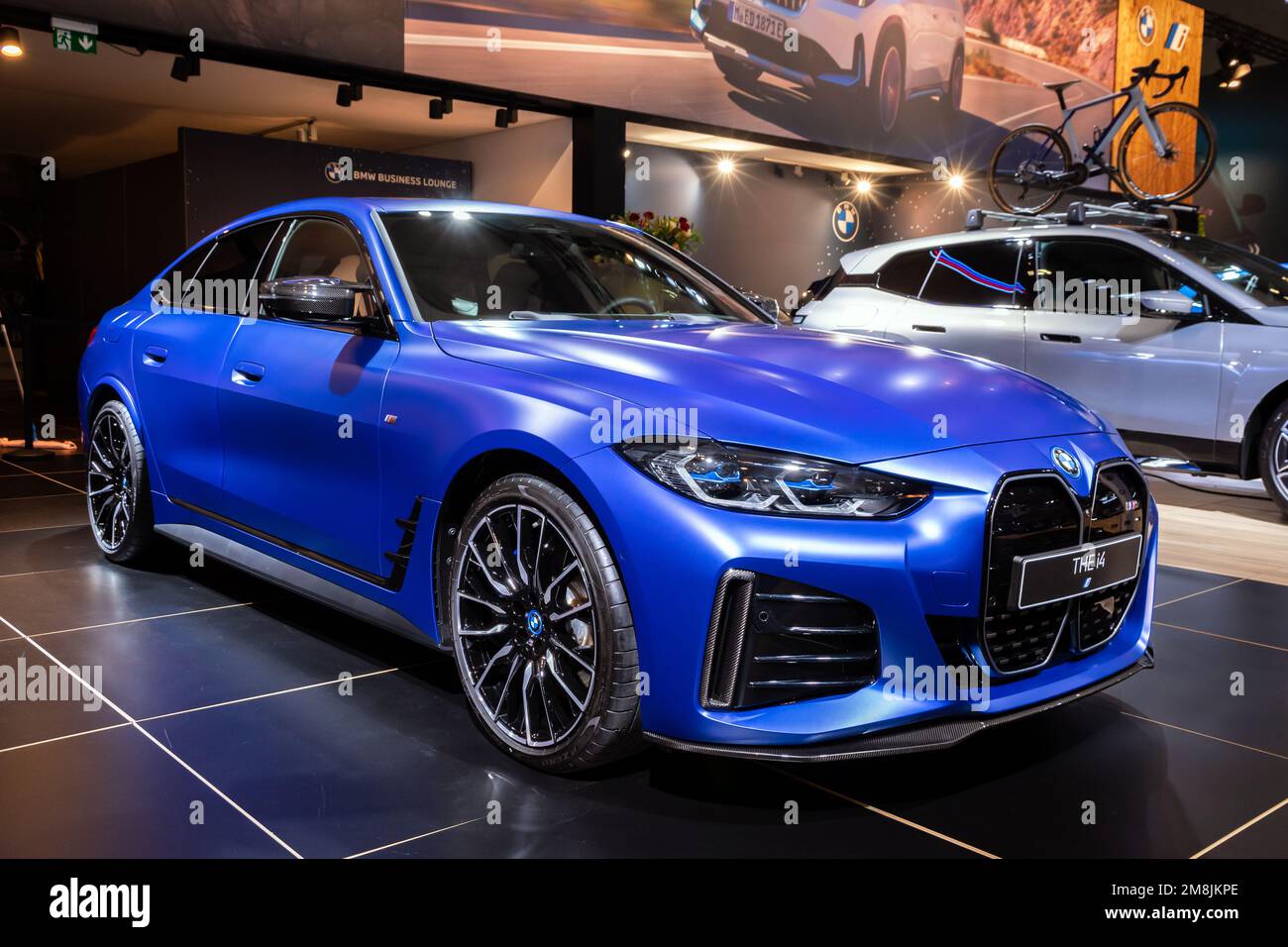BMW i4 (G26) all-electric Gran Coupe car at the Brussels Autosalon European Motor Show. Brussels, Belgium - January 13, 2023. Stock Photo