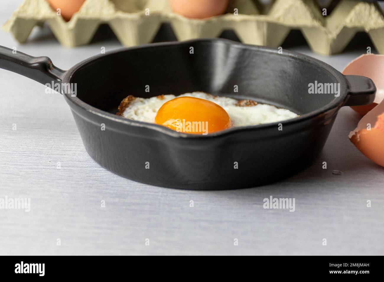 fried egg in a frying pan Stock Photo