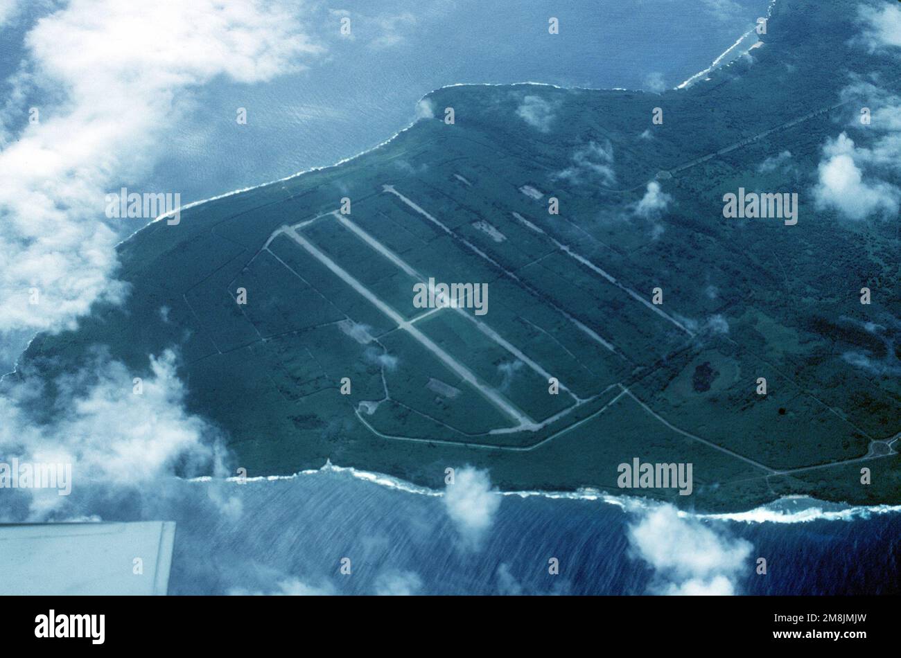 An aerial view of the USAAF North Field on Tinian Island. It was from here in World War Two that B-29 bombers flew long range missions against mainland Japan. Both the missions to Hiroshima and Nagasaki originated from this airstrip nearly half a century ago. Base: Tinian Island Country: Northern Mariana Islands (MNP) Stock Photo
