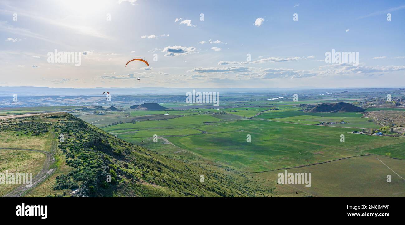 Paragliders flying in Idaho Stock Photo