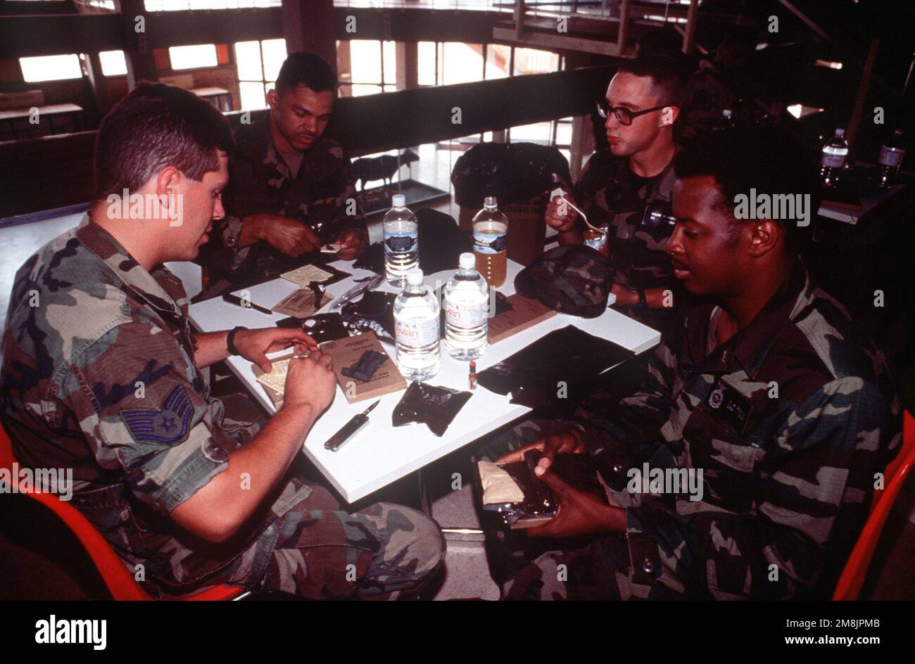 Soldiers and Airmen eat MREs (Meals Ready to Eat) for lunch together ...