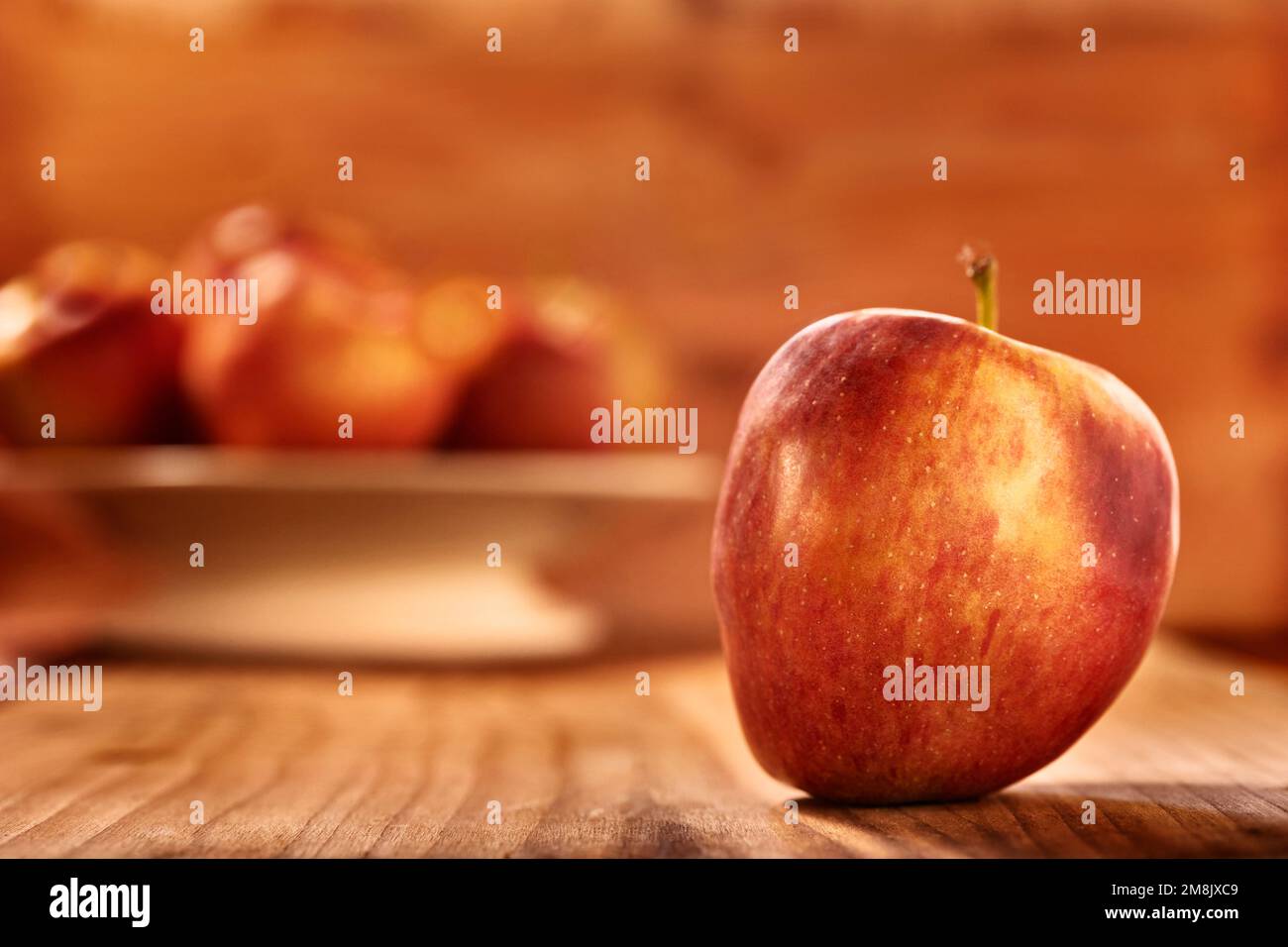 One red apple on wooden table , healthy eating Stock Photo