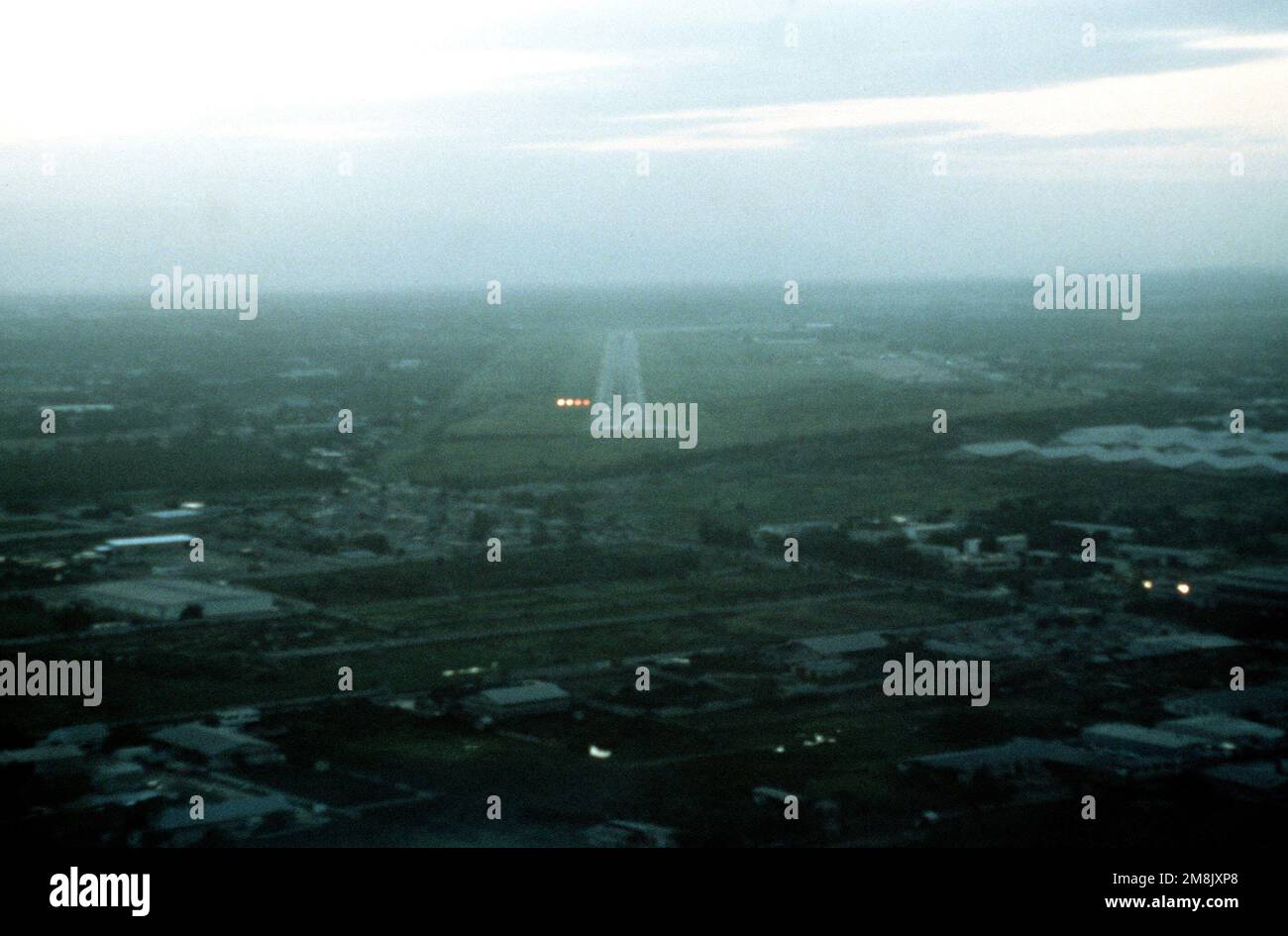 Long Rang View A long range view of the approach and landing on runway 090. Large ...