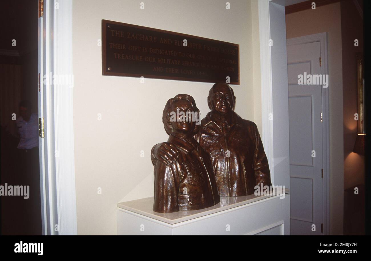 A sculptured bust of Elizabeth and Zachary Fisher and the dedication
