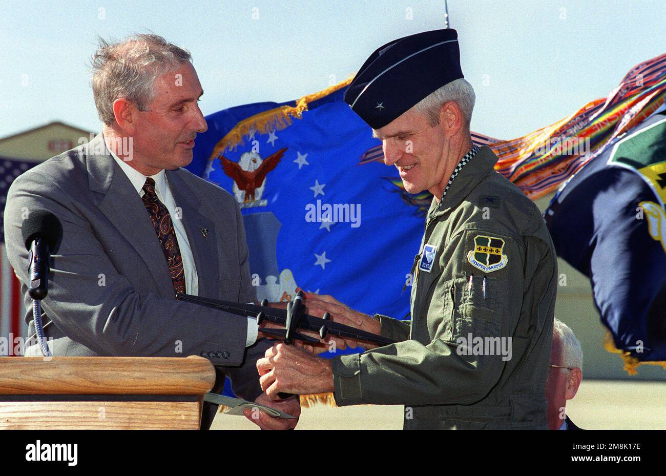GEN. John W. Rutledge. 9th Reconnaissance Wing Commander, receives a
