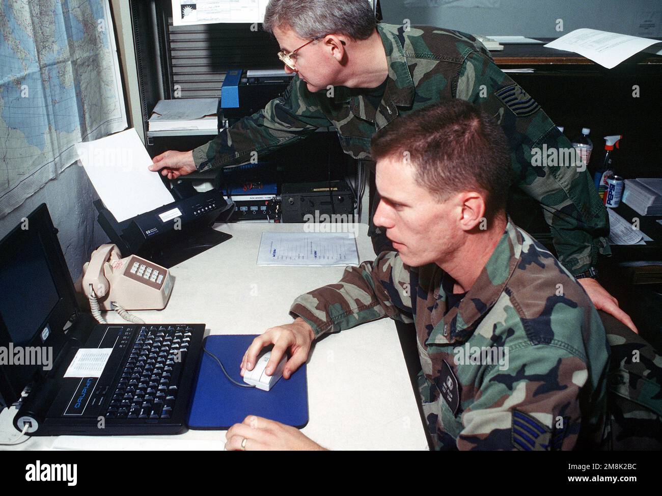MSGT Donald G. Gunning (top) and SSGT Marc E. Allen (bottom) receive