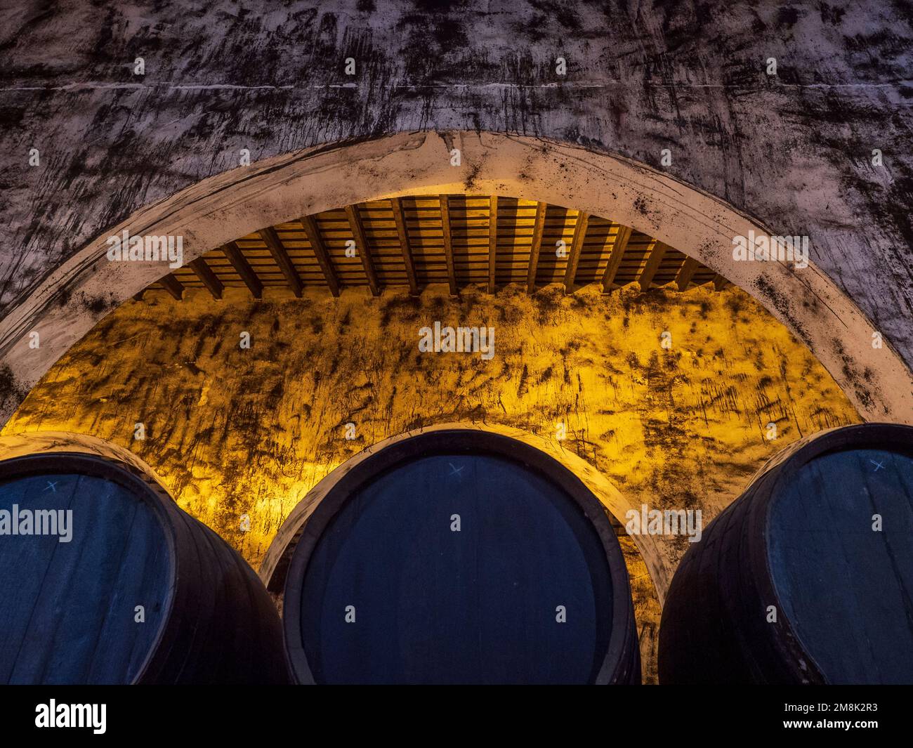 Wooden barrels in the Puerto de Santa Maria wine cellar Stock Photo Alamy
