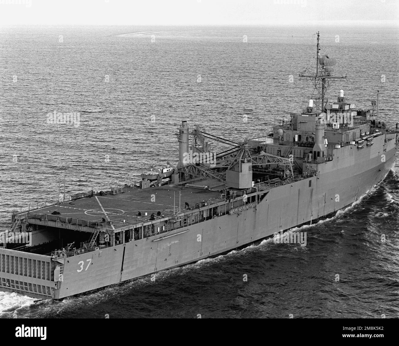 Low oblique starboard quarter view of the dock landing ship USS