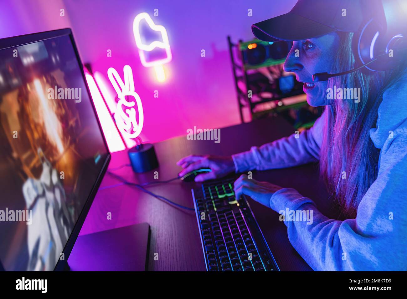 Playing computer game aggressive hi-res stock photography and images - Alamy