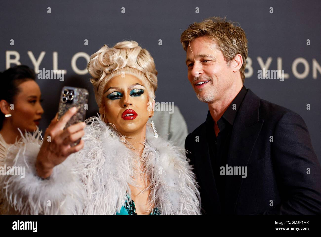 Actor Brad Pitt poses with Drag Queen Lolita Banana during a photocall for the film ''Babylon" at the Grand Rex in Paris, France January 14, 2023. REUTERS/Gonzalo Fuentes Stock Photo - Alamy