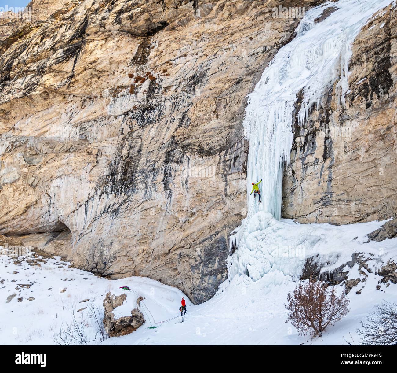 Elijah Weber climbs the Boy Scout ice climb rated WI 4-5 in The Ruby Mountains Stock Photo