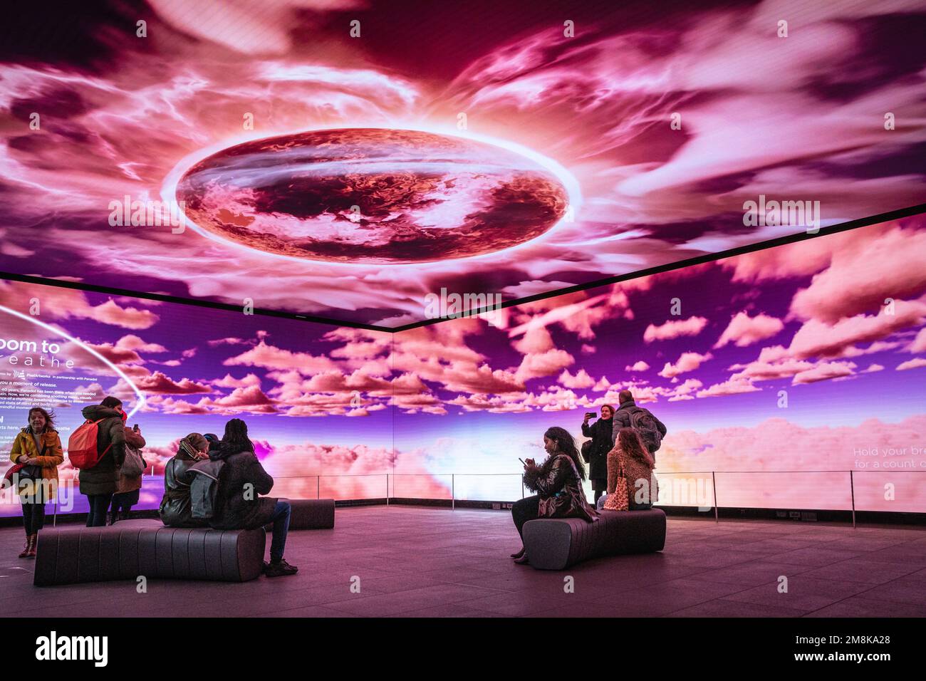 London, UK. 14th Jan, 2023. People look at the installation, featuring