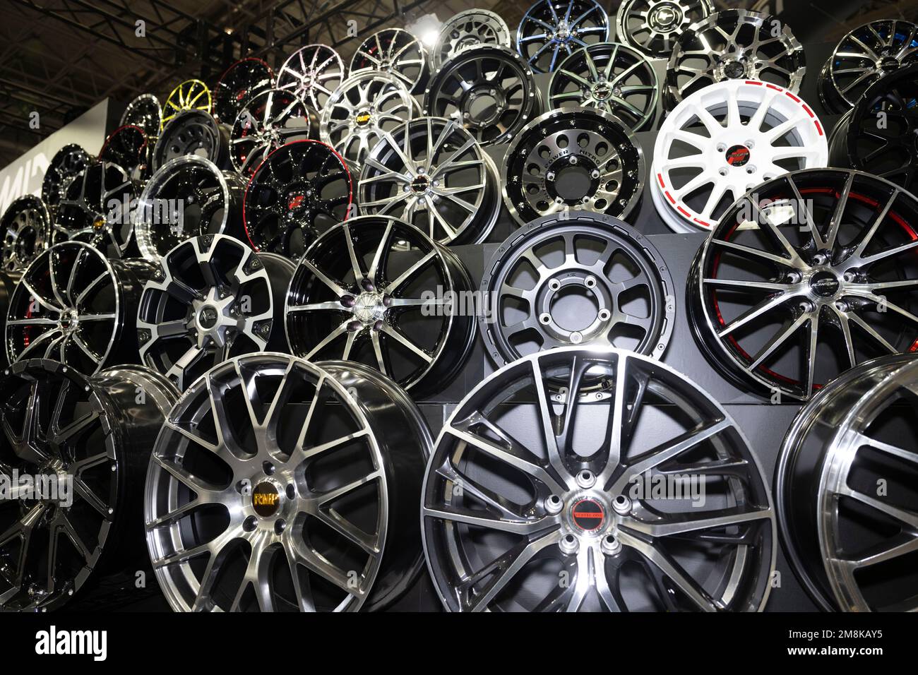 Chiba, Chiba Prefecture, Japan. 13th Jan, 2023. Wheel rims on display. Tokyo Auto Salon (æ±äº¬ã‚ªãƒ¼ãƒˆã‚µãƒ-ãƒ³) is considered one of the most prestigious aftermarket car shows in the world, attracting car enthusiasts, manufacturers, and media from all over the globe. The show features a wide range of customized and high-performance cars, including sports cars, luxury cars, and even trucks and buses. Visitors can also expect to see car-related products and technology such as wheels, tires, audio systems, and car electronics. Some of the most notable manufacturers that participate in the Stock Photo