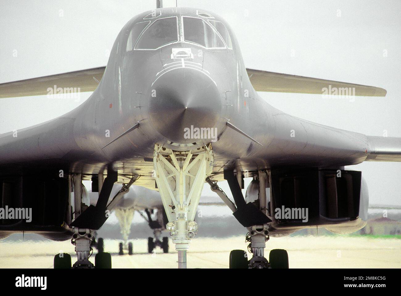 A closeup, noseon view of the lead B1B Lancer bomber named "Hellion
