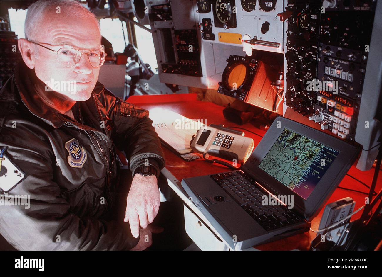 USAF MASTER Sergeant Ike Isaacman monitors a Global Positioning System ...