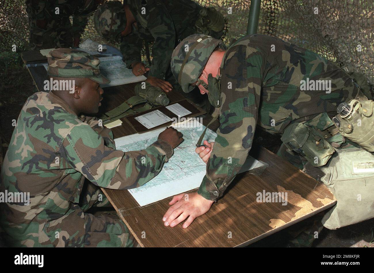 During the Expert Infantry Badge (EIB) training, soldiers are shown coordinates on a map. Base: Fort Stewart State: Georgia (GA) Country: United States Of America (USA) Stock Photo