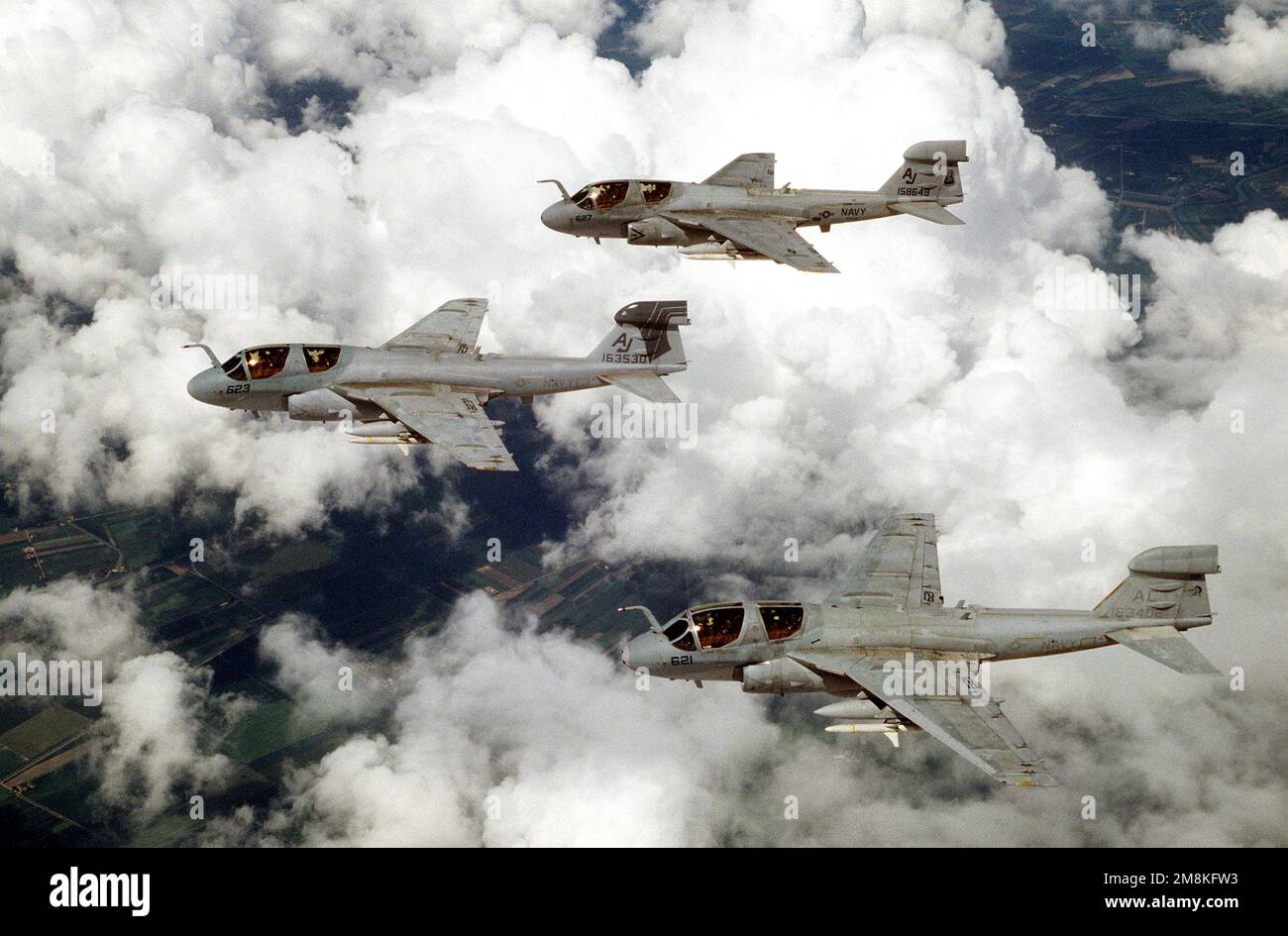 An air-to-air view of three Navy EA-6B Prowler aircraft flying in formation on a training mission. They are (top to bottom) VAQ-209 Star Warriors, VAQ-141 Shadowhawks and VAQ-130 Zappers, all from Whidbey Island, WA. Exact Date Shot Unknown. Subject Operation/Series: DENY FLIGHT Base: Aviano Air Base State: Pordenone Country: Italy (ITA) Stock Photo