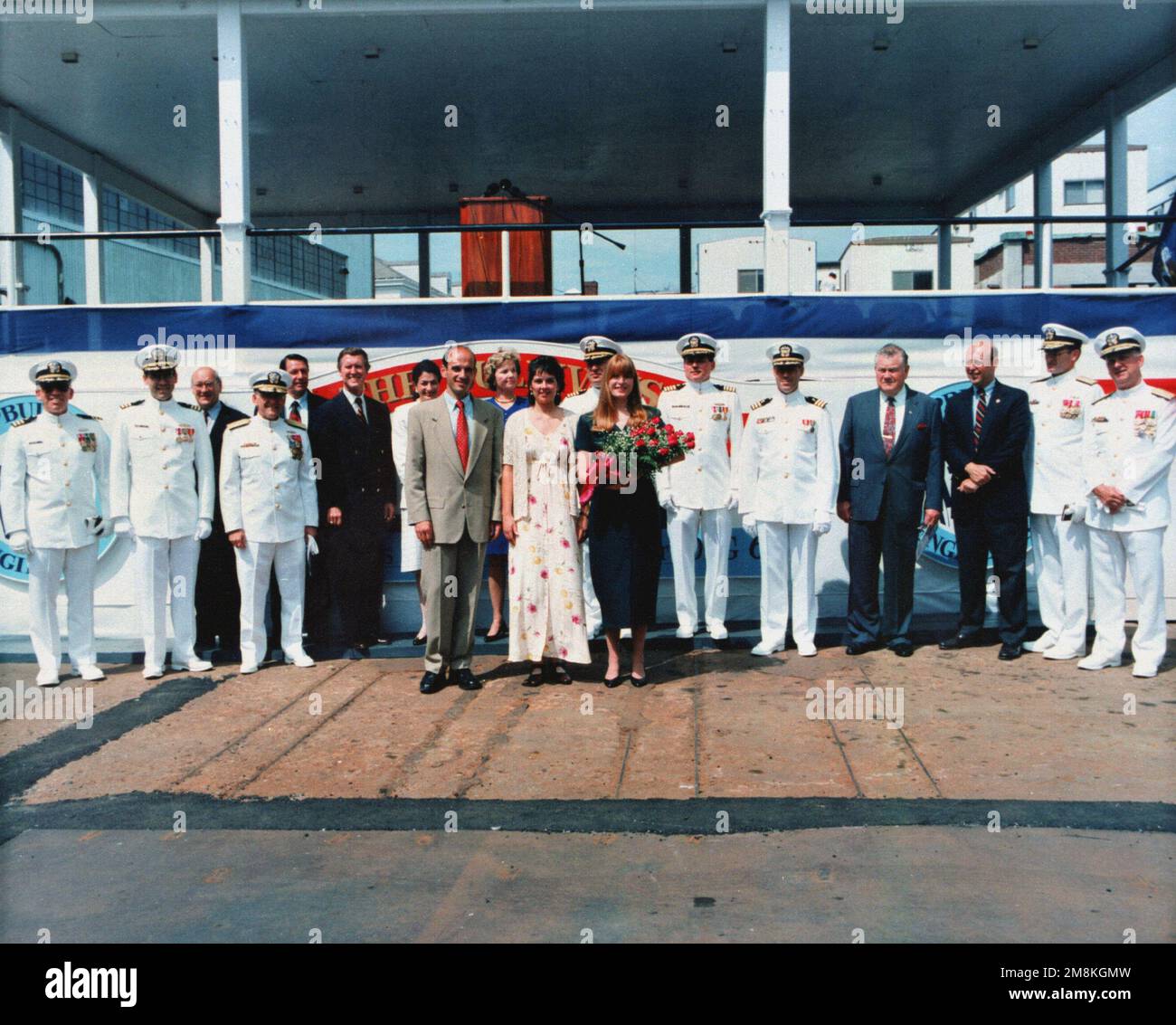 The official party for the christening and launch of the guided missile destroyer USS The Sullivans (DDG-68). Left to right, CDR. Roncolato, CDR. Ingram, Mr. Fitzgerald, RADM Retz, Mr. Taylor, Hon. William Cohen, Hon. Olympia J. Snowe, Hon. John Baldacci, Mrs. Mustin, Heather S. Hudson, CAPT. Rubel, Kelly Ann Sullivan Loughren, CAPT. Staples, CDR. Russo, RADM Meyer, Hon. James B. Longley, Jr., RADM George A. Huchting, and VADM Philip M. Quast. Base: Bath State: Maine (ME) Country: United States Of America (USA) Stock Photo