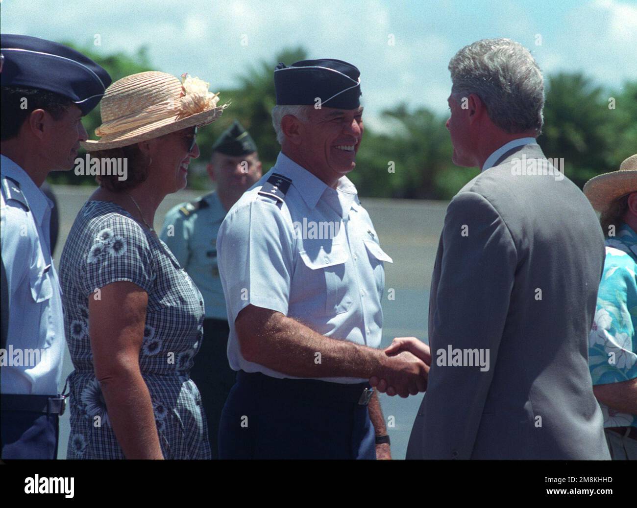 GEN. John G. Lorber, Commander USPACOM, and his wife, greet President William Jefferson Clinton upon his arrival for the commemoration of the 50th anniversary of World War II. Base: Hickam Air Force Base State: Hawaii (HI) Country: United States Of America (USA) Stock Photo