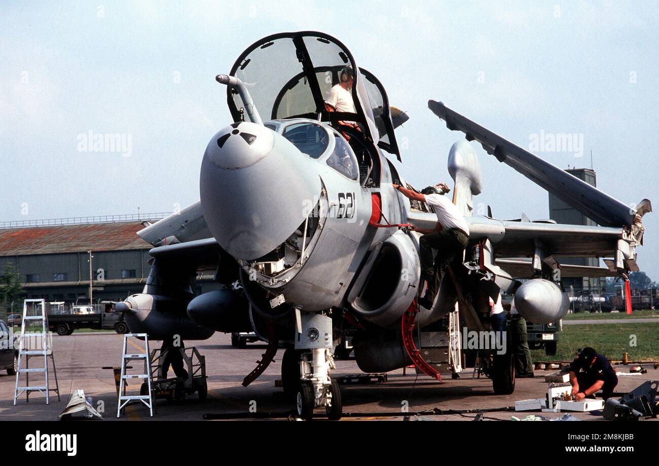 US Navy aircraft maintenance personnel perform a 56 day preventive