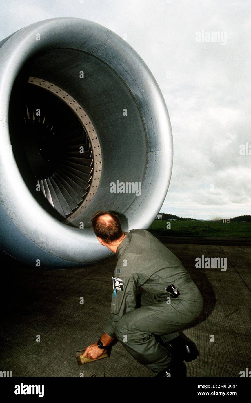 CAPT. Rick Poel, pilot from the 912th ARS Grand Forks ND, checks the ...