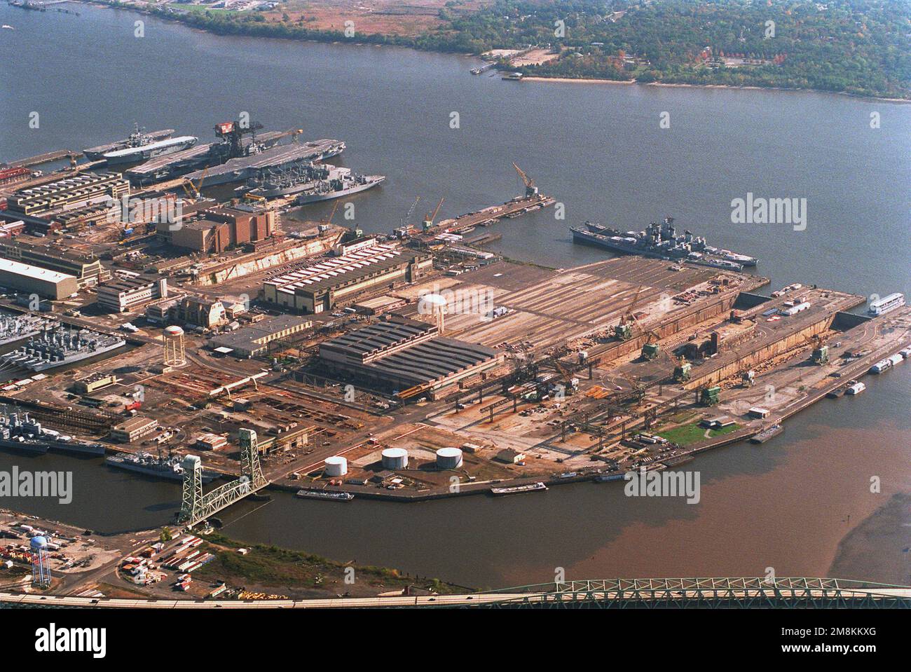 An aerial view of the Philadelphia Naval Shipyard looking southeast. The shipyard closed on