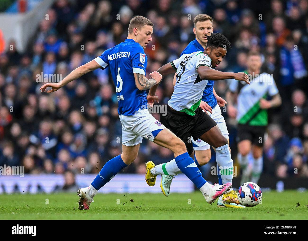Plymouth Argyle forward Niall Ennis  (11) goes past Ipswich Town defender Luke Woolfenden  (6)  during the Sky Bet League 1 match Ipswich Town vs Plymouth Argyle at Portman Road, Ipswich, United Kingdom, 14th January 2023  (Photo by Stanley Kasala/News Images) Stock Photo