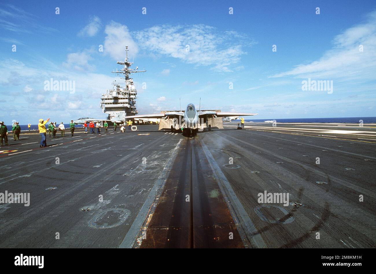 A view looking straight up catapult two at an F-14A Tomcat aircraft of Reserve Fighter Squadron 101 (VF-101) poised for takeoff on board the aircraft carrier USS JOHN F. KENNEDY (CV-67) during carrier qualifications off the coast of Florida.EXACT DATE SHOT UNKNOWN. Country: Atlantic Ocean (AOC) Stock Photo