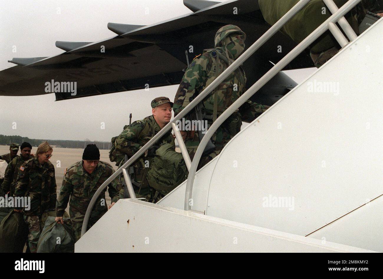 Members of the 23rd Aeromedical Evacuation Squadron board a Dover AFB