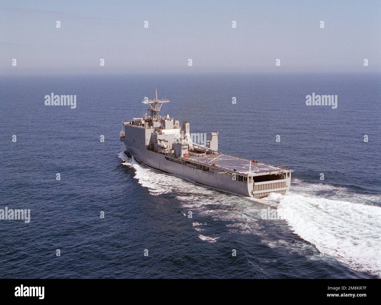 A port quarter view of the amphibious dock landing ship USS OAK HILL (LSD-51) underway during builders sea trials. Country: Gulf Of Mexico Stock Photo