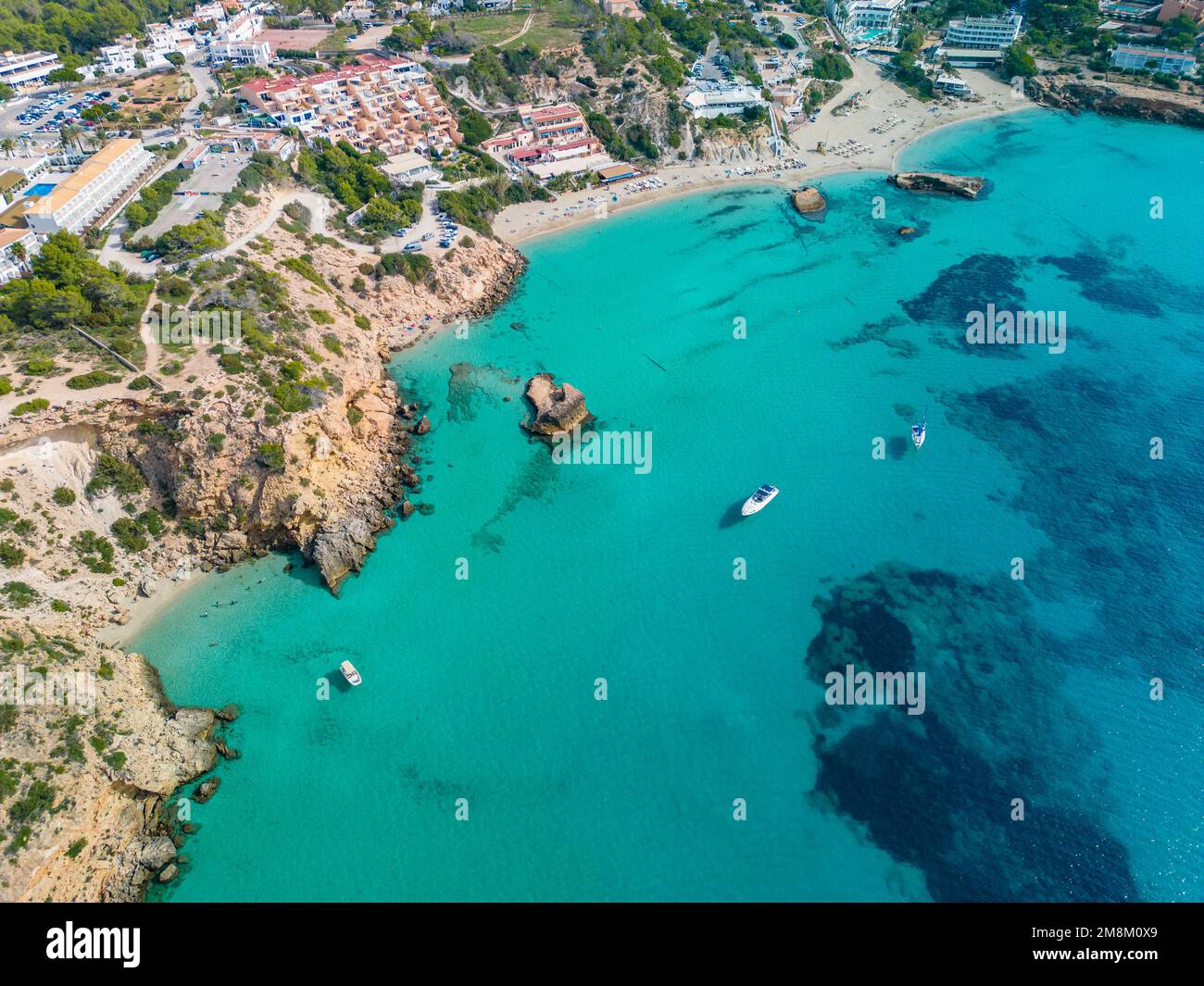 Tarida Aerial drone view of a beautiful coast and sea in Cala Tarida, Ibiza ...