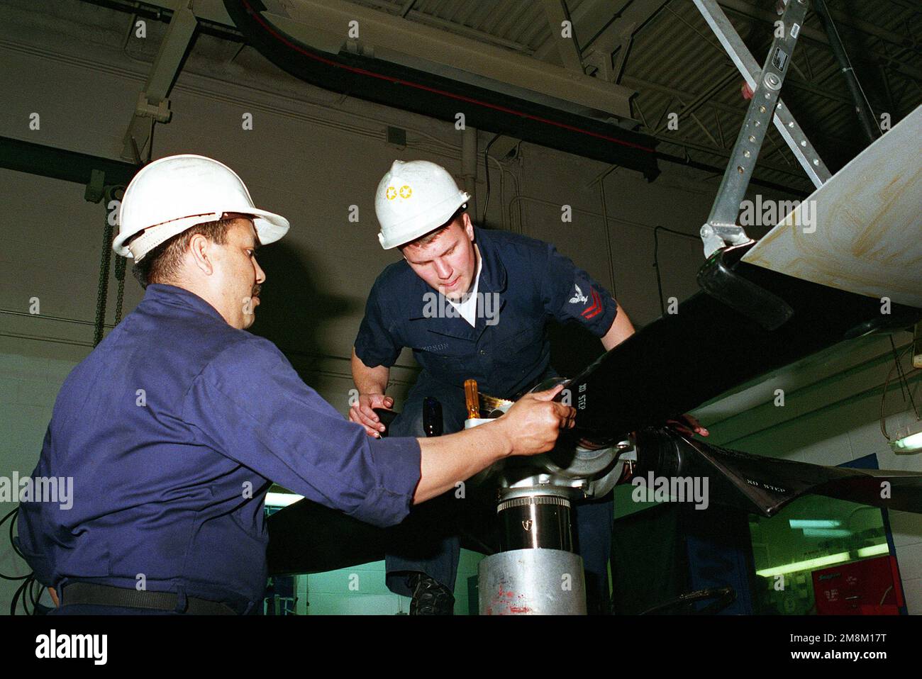 Aviation Mechanic Mate's Second Class (AD2) Frank Fassio and AD2